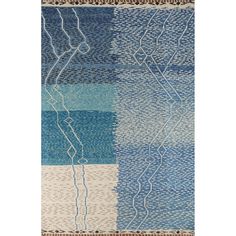 a blue and white rug with different patterns on it