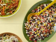 two bowls filled with different types of food on top of a white table next to each other