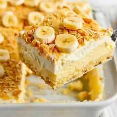 a close up of a piece of cake with bananas on top