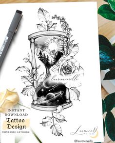 an inking card with flowers and plants on it, next to a pen and flower pot