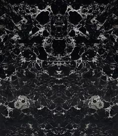 an abstract black and white marble pattern that looks like it has been made into a wallpaper