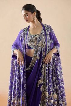 Purple sharara with resham, sequin, zari thread, bead embroidery in floral pattern on border. Paired with floral yoke embroidered blouse, border embroidered drape and longline jacket. - Aza Fashions Reception Choli With Zari Work And Front Open, Front Open Choli With Zari Work For Reception, Resham Embroidered Front Open Choli For Reception, Bollywood Style Front Open Choli With Zari Work, Bollywood Style Front Open Choli With Dupatta, Bollywood Style Front Open Georgette Dupatta, Bollywood Style Set With Side Open Dupatta, Bollywood Style Side Open Sets With Dupatta, Bollywood Style Lehenga With Side Open And Dupatta