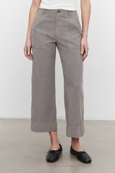 Featuring a pinwale corduroy (this is the skinniest, least bulky type) these casual trousers are fab. With a cropped, wide leg and utility details like patch pockets on the front and rear, these bottoms have a slightly higher rise that hits at the natural waist. A flattering silhouette that is equally chic. Corduroy Ankle-length Workwear Bottoms, Wide Leg Corduroy Pants With Patch Pockets, Wide Leg Corduroy Pants With Pockets, Corduroy Wide Leg Pants With Pockets, Wide Leg Corduroy Bottoms With Side Pockets, Fall Cropped Cargo Pants, Fall Cargo Cropped Pants, Corduroy Bottoms With Welt Pockets For Work, Corduroy Ankle-length Workwear Pants