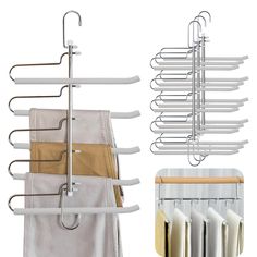 an over the door drying rack with five hangers and six pants hanging from it