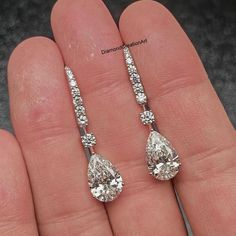 Moissanite Dangle Drop Earrings, 5.40 tcw Pear Cut Moissanite Drop Earrings, 14K White Gold Wedding Earrings, Engagement Bridal Earrings Detail about stones Moissanite & Simulated Stone: ----------------------------- ➠Stone Shape : Pear ➠Stone Size : 11x8 MM ➠Weight: 5.40 TCW ➠Color: Colorless ➠Cut: Excellent ➠Clarity: VVS ✍This Listing's images are only for Imagin about this item. This is all our photography. If you place the order then the same item we can make it. ✍ This displayed all product Gold Wedding Earrings, Pearl Earrings Designs, Gold Earrings Wedding, Gold Engraving, White Gold Wedding, Platinum Metal, Fashion Wedding, Dream Jewelry, Pear Cut