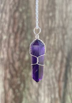 Amethyst necklace with 18 inch silver plated chain size and color vary Amethyst Crystal Necklace, Amethyst Necklace, Crystal Necklace Pendant, Wrapped Pendant, Wire Wrapped Pendant, Amethyst Crystal, Necklace Pendant, Crystal Necklace, Wire Wrapped