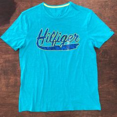 Tommy Hilfiger T Shirt Sz Large Tommy Hilfiger Green Cotton Tops, Casual Green Tommy Hilfiger Tops, Blue Tommy Hilfiger T-shirt With Letter Print, Tommy Hilfiger Blue T-shirt With Letter Print, Tommy Hilfiger Blue Summer T-shirt, Tommy Hilfiger Blue Logo Print Tops, Tommy Hilfiger Short Sleeve T-shirt For Summer, Tommy Hilfiger Graphic Print Short Sleeve Shirt, Tommy Hilfiger Blue Short Sleeve Tops