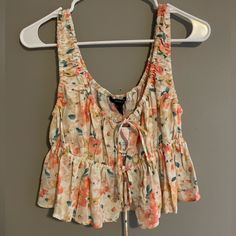 Size: L Brand: Forever 21 Condition: Nwt Cute Forever 21 Tank Topnwt! Perfect For Spring And Summer. Note: All Items Are Checked For Flaws And Noted In The Description Above. Color May Vary Slightly From The Photo Depicted. Please Keep In Mind That Items Come From A Pet Friendly Home. Thank You! Forever 21 Floral Print Cotton Tops, Chic Forever 21 Floral Print Tops, Trendy Forever 21 Floral Print Crop Top, Forever 21 Cotton Cami Tank Top, Forever 21 Sleeveless Floral Print Top, Forever21 Tops, Forever 21 Tops, Keep In Mind, Pet Friendly