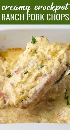 creamy crockpot ranch pork chops in a white casserole dish with green garnish