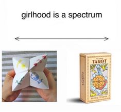 an origami butterfly with the caption'childhood is a spectrum '