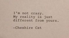 an old typewriter with the words i'm not crazy, my reality is just different from yours