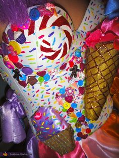 a close up of a clown's hat with sprinkles on it