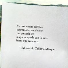 a close up of a piece of paper with a poem written in spanish on it