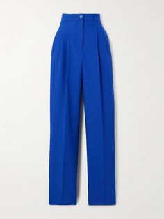 British-Nigerian designer Tolu Coker pulls inspiration from her varied backgrounds to create collections that feel particularly inspired. These pants are made from twill in a vibrant cobalt shade - the founder says color plays a crucial role within Yoruba culture. They sit high on the waist and have straight legs with sharp pleats.