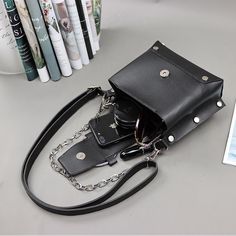 Specification:Material: PU leatherSize: 20*16*12 cm Usage: Shoulder Bag, Handbags,Crossbody bag [23y 9m 19d] Edgy Black Bag With Hardware Details, Edgy Black Bag With Hardware, Edgy Black Bags With Hardware, Black Punk Style Shoulder Bag With Large Capacity, Black Punk Shoulder Bag With Rivets, Rectangular Shoulder Bag With Rivets For Travel, Edgy Black Shoulder Bag With Rivets, Black Rectangular Punk Bag, Black Punk Rectangular Shoulder Bag