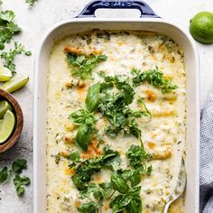 a casserole dish with broccoli and cheese in it on a table