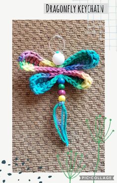 the dragonfly keychain is made with yarn and beads