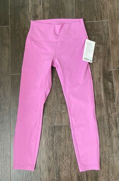 Lululemon Wunder Under HR Tight 25” MGLO Magenta Glow 29869 Size 8 NWT. Designed for: Yoga Hugged sensation: Engineered to feel like a comfortable embrace throughout—it holds you close and moves with you Hidden card pocket : Hidden pocket in waistband holds your key or card No-dig waistband: Soft, no-dig waistband lies flat against your skin High-rise: Keeps you feeling covered and secure Full-on Luxtreme fabric Inseam: 25" Comes from smoke free home. All sales are final so please ask all questi Hidden Pocket, Lululemon Leggings, Feel Like, Tights, High Rise, How Are You Feeling, Leggings, Yoga, Key