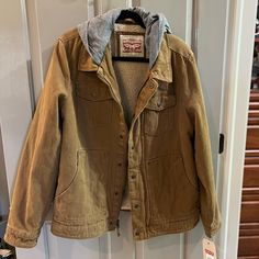 Levi’s Nwt Canvas Dark Beige Jacket With Sewn On Grey Hood. So Cute. Size Large. Beige Jacket, Canvas Jacket, Levis Jacket, Dark Beige, Levis Men, Grey Hoodie, So Cute, Levi's, Mens Jackets