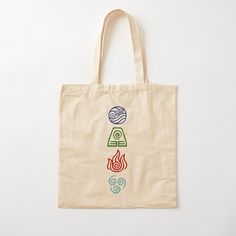 a tote bag with three symbols on it