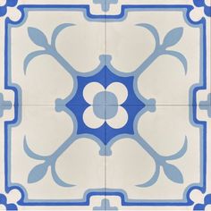 a blue and white tile design on the floor