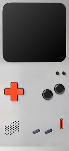 a close up of a nintendo wii game controller with an orange cross on the front