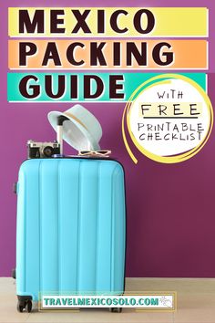 a blue suitcase sitting on top of a wooden floor next to a sign that says mexico packing guide