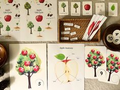 an apple tree is shown with matching cards and numbers to match it's fruit