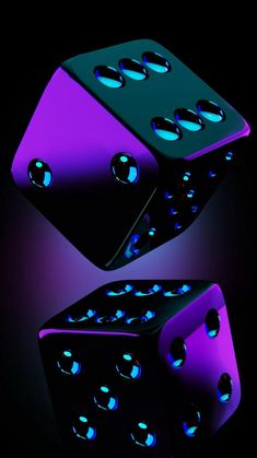 two purple and black dices are in the dark