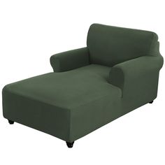 a green couch sitting on top of a white floor