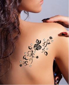 a woman with a tattoo on her back