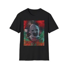 A trendy and comfortable T-Shirt featuring Art the Clown design, perfect for horror movie fans and Halloween enthusiasts. The classic fit and crew neckline make it suitable for everyday wear or themed events. Made with 100% ring-spun cotton for a lightweight and durable fabric. Product features - Unisex softstyle T-shirt made with 100% ring-spun cotton - Classic fit with crew neckline for versatile style - Ethically grown and harvested US cotton - Variety of fabric blends available for different color options - Perfect for horror movie fans and Halloween celebrations Care instructions - Do not dryclean - Machine wash: warm (max 40C or 105F) - Do not bleach - Tumble dry: low heat - Iron, steam or dry: low heat Halloween Band Merch T-shirt With Graphic Design, Black Horror Graphic Print Shirt, Halloween Streetwear Shirt With Sublimation Print, Halloween Graphic T-shirt For Streetwear, Halloween Short Sleeve T-shirt For Streetwear, Horror Graphic Print Tops For Fan Merchandise, Short Sleeve T-shirt For Halloween Streetwear, Horror Graphic Print Short Sleeve Shirt, Halloween Band Merch Shirt With Crew Neck