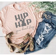 a t - shirt with the words happy easter written on it and high heeled shoes