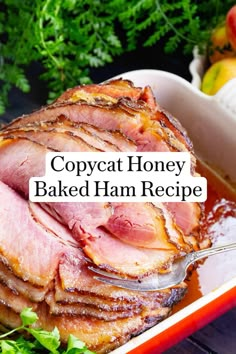 a close up of food on a plate with text overlay that reads copycat honey baked ham recipe