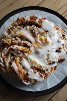 a close up of a doughnut covered in icing