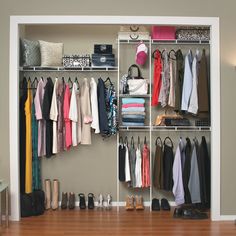 an organized closet with clothes, shoes and other items on it's shelves in a home