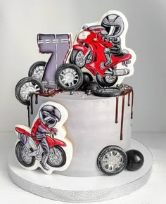 a cake decorated with an image of a motorcyclist