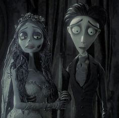 corpse bride and groom standing next to each other