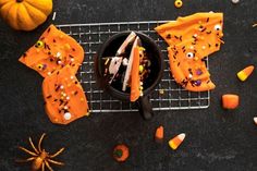 halloween treats are arranged on a wire rack