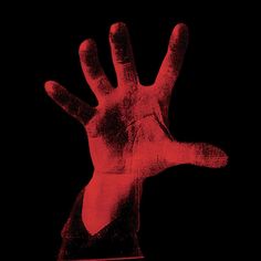 a red hand on a black background