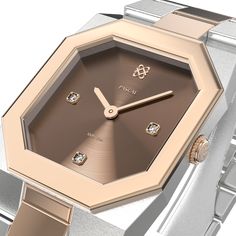 A rich mocha brown dial framed by a rose gold bezel, coupled with a metal link bracelet alternating in rose gold and silver tones, defines this timepiece. The octagonal case design embraces vintage aesthetics, enhanced by laboratory-grown diamonds, symbolizing a harmonious connection between the past and present. Case: 27mm steel case with polished and satin finish. Movement: High-quality quartz movements Waterproofness: Water-resistant up to 3 bar (approx. 30 meters/100 feet). Crystal: Scratch Rose Gold Watch With Rectangular Metal Dial, Rose Gold Watches With Metal Rectangular Dial, Rose Gold Watches With Rectangular Metal Dial, Rose Gold Rectangular Dial Watch, Rose Gold And Silver, Vintage Aesthetics, White Lab, Mocha Brown, Past And Present