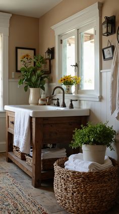 a white sink sitting next to a window in a bathroom on top of a rug