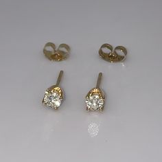 Real & Beautiful! Solid, Stamped 14k Yellow Gold Diamond Stud Earrings. Round Cut, Natural Diamond Solitaires. Approximately 1/3ctw. Perfect For The Minimalist, First Diamonds, Higher Up On The Ear. Mismatched Backings. Unisex Design. Final Price, No Trades. Classic Yellow Gold Earrings With Prong Setting, Yellow Gold Oval Earrings, Classic 14k Gold Earrings For Anniversary, Classic Yellow Gold Earrings For Anniversary, Classic Gold Earrings With Brilliant Cut, Classic 14k Gold Diamond Cut Earrings, Classic Gold Brilliant Cut Earrings, Fine Jewelry 14k Stamped Round Cut Earrings, Fine Jewelry 14k Stamped Earrings