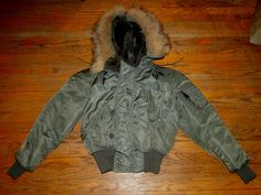 Over seas by express mail only. to some places it take about 7-15 days Shiping cost for over seas:100 Measurement Shoulder to shoulder ;="inches Shoulder to end of cuff ; ="inches Pit to pit ;23 "inches Back collar to hem ;25 " inches Vintage Army Jacket, Flying Jacket, Jacket Fur, Pilot Jacket, Fur Collar Jacket, Army Jacket, Types Of Jackets, Vintage Winter, Fur Hood