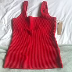 New York & Company Red Tank Top Size Large, Fits True To Size Very Comfortable And Thick/Stretchy Material Brand New, Never Worn! Tag Madewell, Billabong, Forever 21 Trendy Red Ribbed Tank Top, Red Ribbed Stretch Tank Top, Red Stretch Ribbed Tank Top, Red Ribbed Sleeveless Top, Red Sleeveless Ribbed Tops, Chic Red Ribbed Top, Red Ribbed Summer Top, Red Ribbed Top For Summer, Trendy Red Tank Top For Day Out