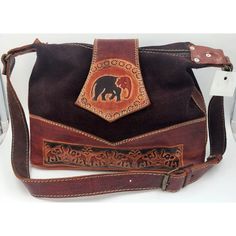 This Is A Beautiful Leather Purse/Shoulder Bag/Handbag With An Adjustable Strap. The Stitching And Details Are Adorable. Really Cute Boho/Hippie Style. Diesel Brown Leather Measurements Are Approximately 13.5" X 3.75" X 9" Tall. In The Photos, The Strap Is 33" And Can Extend One More Inch. One Zippered Inside Pocket We Do Our Very Best To Disclose Everything We See With Photos & Descriptions. Colors May Vary A Shade Or Two Due To The Lighting. New With Tags Hand Tooled Leather Shoulder Bag For Travel, Brown Hand Tooled Shoulder Bag For Travel, Travel Brown Hand Tooled Shoulder Bag, Brown Leather Backing Crossbody Shoulder Bag, Brown Leather Lined Hobo Shoulder Bag, Brown Leather Satchel Shoulder Bag, Brown Leather Backing Crossbody Bag, Brown Leather Backed Shoulder Bag For Daily Use, Traditional Leather Satchel With Adjustable Strap