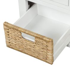 a white dresser with two drawers and a wicker basket under it's drawer