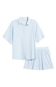 Crisp PJs with a collared short-sleeve shirt and elastic-waist shorts are ones you'll want to wear all weekend long. 26 1/2" length top; 2 1/2" inseam; 31" leg opening; 12 1/2" front rise; 16" back rise (size Medium) Top has front button closure; notched collar; short sleeves; chest patch pocket Shorts have elastic waist 55% cotton, 45% viscose Machine wash, tumble dry Imported Blue Short Sleeve Sleepwear For Summer, Relaxed Fit Pajama Shorts For Summer Daywear, Summer Daywear Collared Camp Shirt, Summer Short Set With Short Sleeves For Loungewear, Summer Collared Camp Shirt For Daywear, Relaxed Fit Summer Sleepwear With Short Sleeves, Blue Short Sleeve Sets For Daywear, Spring Relaxed Fit Collared Sets, Spring Camp Shirt With Camp Collar For Loungewear