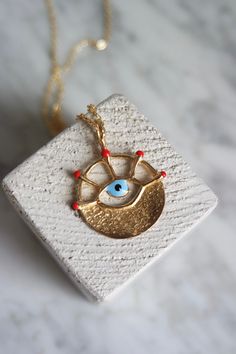 Evil eye medallion is handmade by me it is moulded bronze, enamel is used for the colorful parts. Chain part is silver and rose gold plated. chain length is 55 cm. Evil Eye Gifts, Handmade Gold Enamel Necklaces, Evil Eye Brass Jewelry As A Gift, Brass Evil Eye Jewelry For Gifts, Brass Evil Eye Jewelry As A Gift, Handmade Enamel Pendant Charm Necklaces, Handmade Yellow Gold Enamel Necklaces, Handmade Yellow Gold Enamel Necklace, Handmade Enamel Pendant Charm Necklace