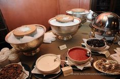 a table topped with lots of different types of food